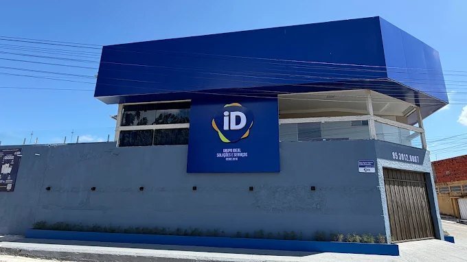 Fachada lateral da sede do Grupo iDeal com placa Grupo Ideal Soluções e Serviços desde 2016